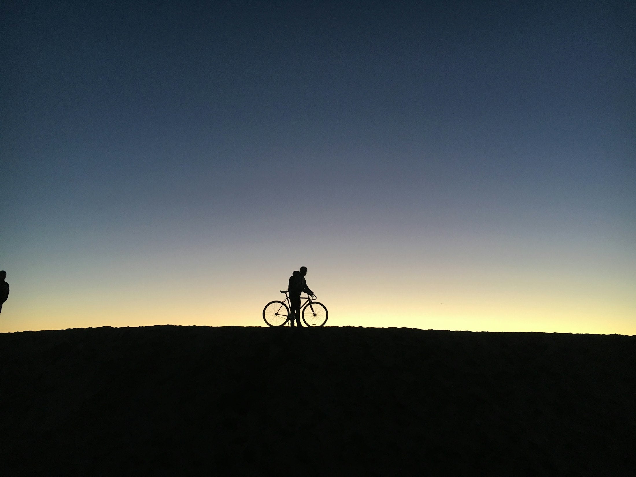 Rider silhouette on a warm horizon